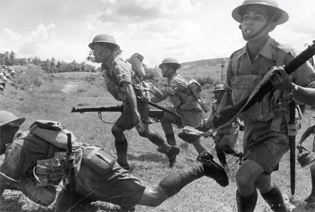 Forward march Malayan soldiers defend their peninsula on 10 February 1942 before the Japanese completed their occupation and pushed the British out